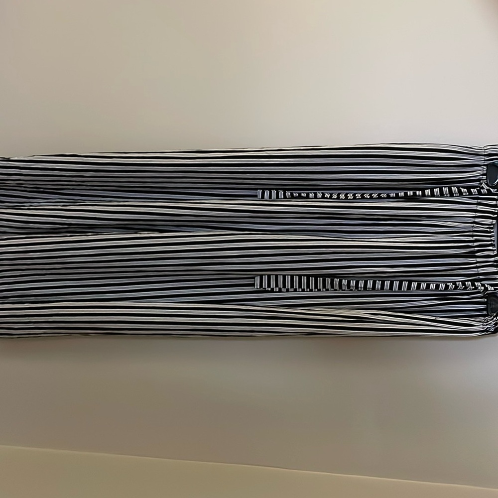 Black and white striped wide leg pants.